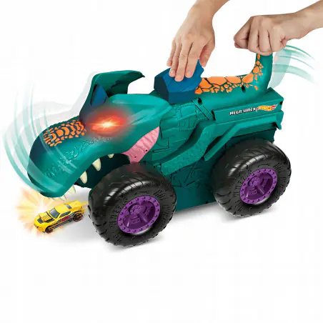 Ten wielki, niezwykły pojazd Pożeracz aut Mega Wrex od Hot Wheels Monster Trucks ma nie tylko światełka i efekty dźwiękowe, ale też wyjątkową funkcję „pożerania i wypuszczania pojazdów! 